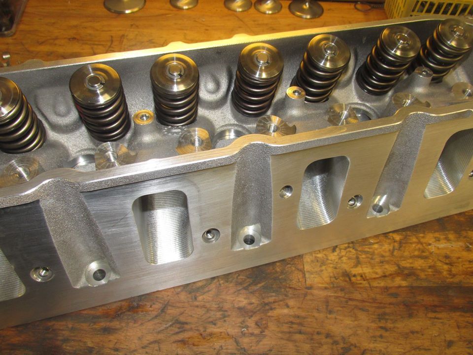 Fully assembled cylinder heads with valve springs
