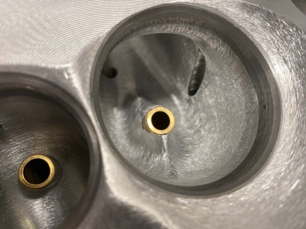 Close-up of a finished combustion chamber and valve seat