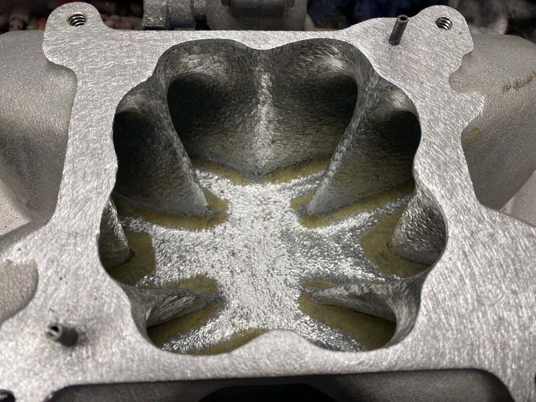 Burr-finished manifold plenum