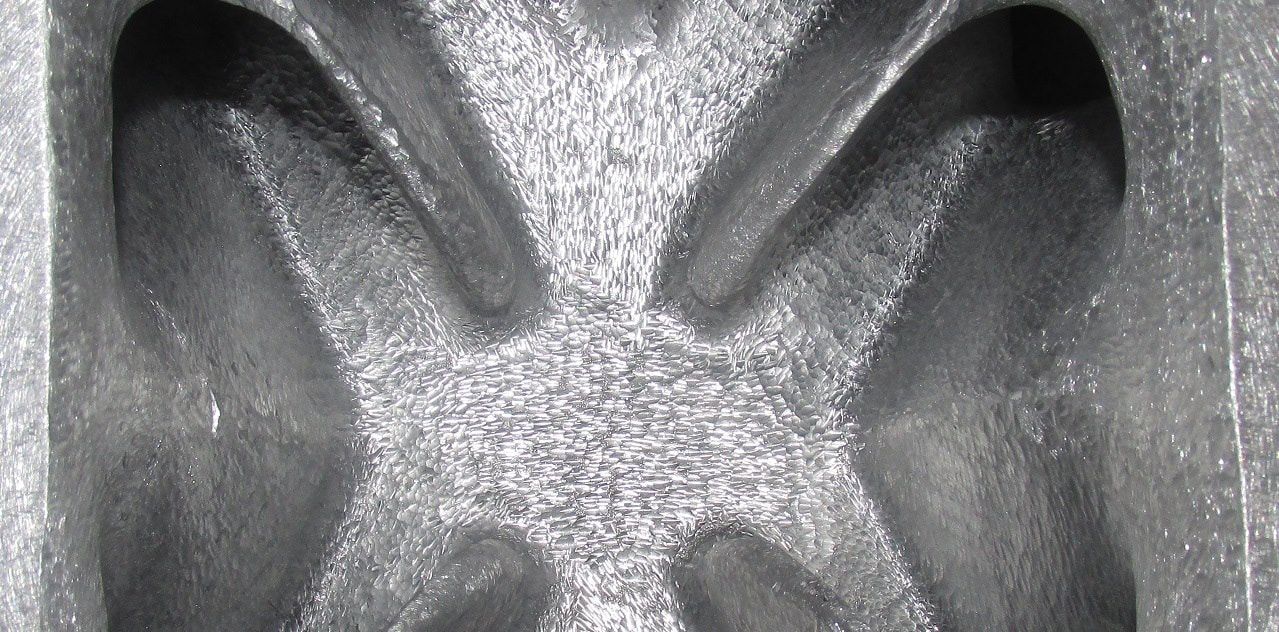 Hand burr-ported manifold runners